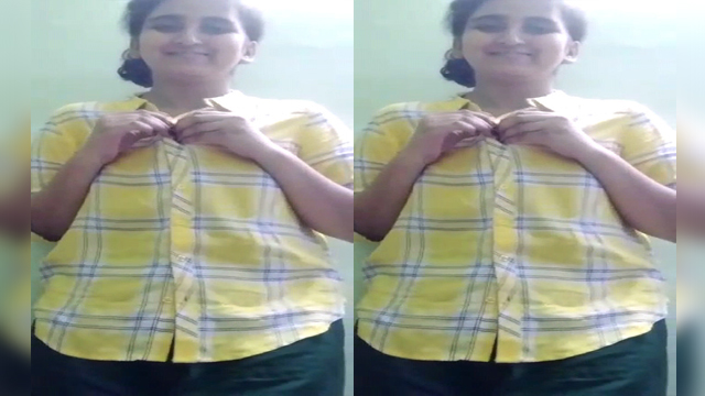 Beautiful girl striping shirt and making video for lover